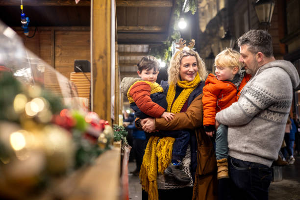 istock Family Visiting the Christmas Markets 2152701106