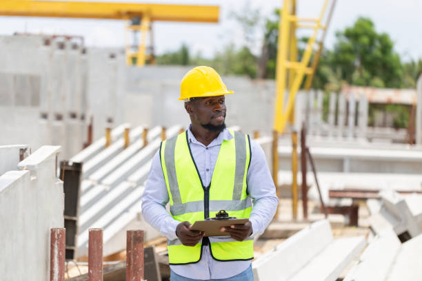 istock Engineer man in hardhats on construction site, Foreman checking project at precast factory site 2152705032