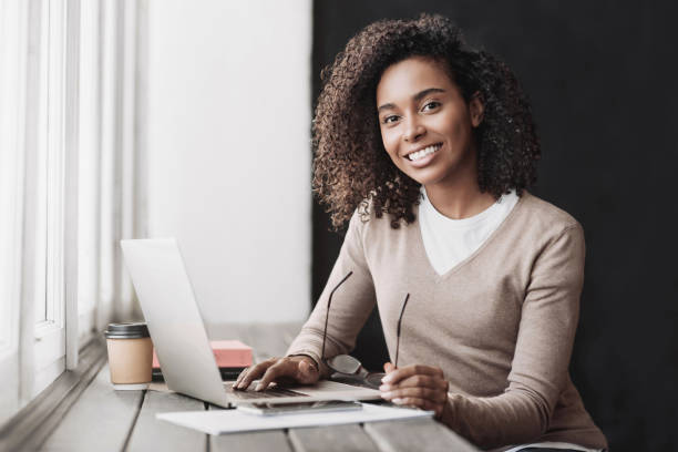 istock Young woman entrepreneur working from home, businesswoman using laptop computer 2152705964