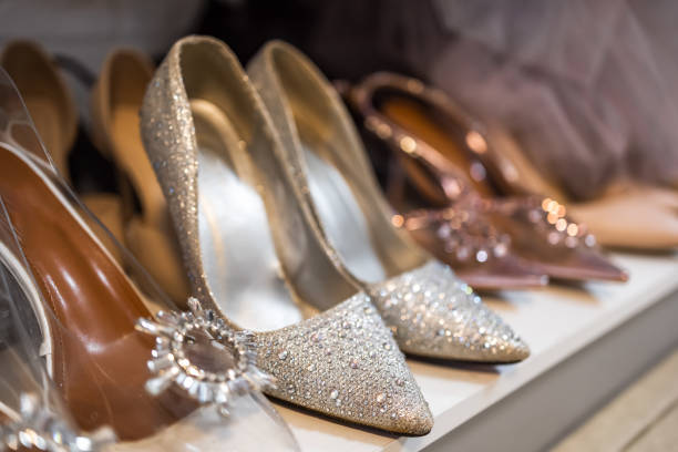 Shiny glittering trend women's high heel shoes for party, birthday, new Year. Festive collection of beautiful unusual women's shoes for the holidays. Social life. Glitter Shoes. Shop or home shelf