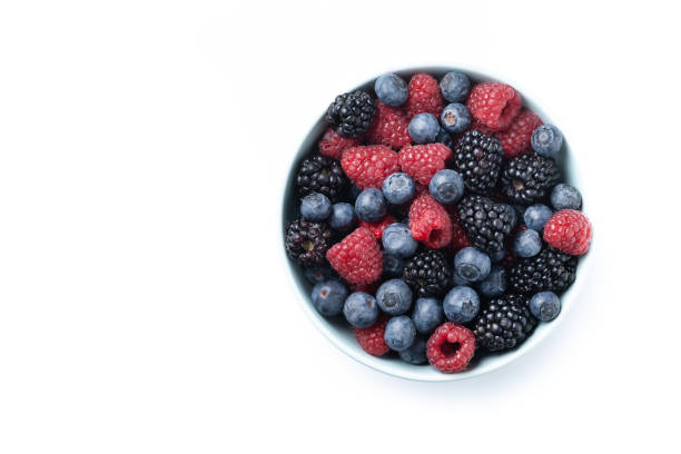 istock Fresh assortment berries isolated on white background 2152707615
