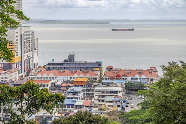 Sandakan, Eastern Borneo, Malaysia - February 13th 2024:   View over the waterfront of the famous Malaysian town from the hills behind the cities
