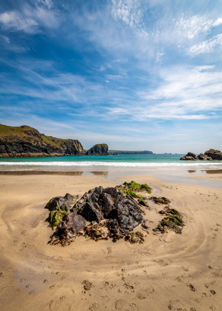 istock Rocky outcrop on Kynance Cove beach 2152708148