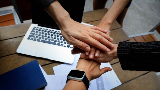 istock Teamwork Concept,Group of diversity people to greeting power tag team,Teamwork Join Hands Partnership Concept of people putting their hands together,Friends with hands showing unity. 2152709146