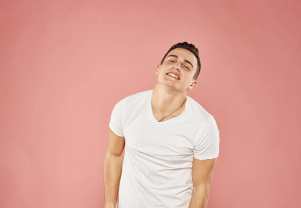 istock Cute man in t-shirt studio pink background fun 2152709226
