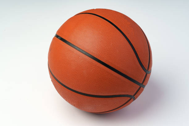 istock New orange basketball ball isolated on white 2152709849