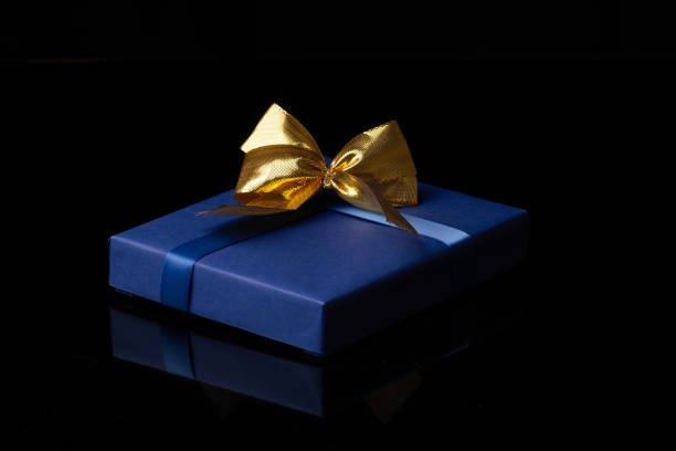 Beautiful gift box on color background