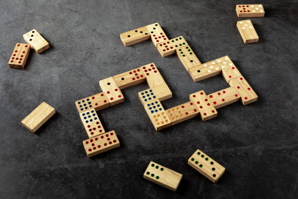 istock domino game on black background 2152712443