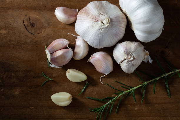 istock garlic on wooden background 2152713228