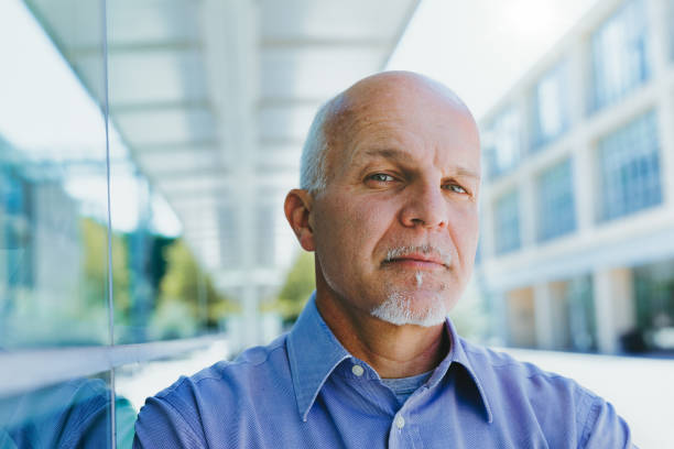 istock Mature man outside, office park in background 2152713403