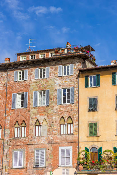 Old houses on the San Michele square in Lucca, Italy