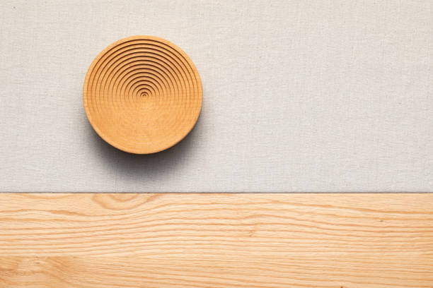 istock Concentric wooden vessels were arranged on linen. Minimalist creative decoration. Decorative creative background. 2152714808