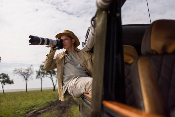 istock Taking a photo from safari jeep! 2152716094
