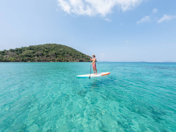 istock Exploring Tropical Waters: Stand-Up Paddleboarding Adventure 2152716800