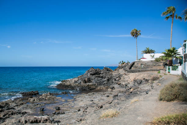 Volcanic coastline at Puerto del Carmen, Lanzarote, Canary Islands, Spain
