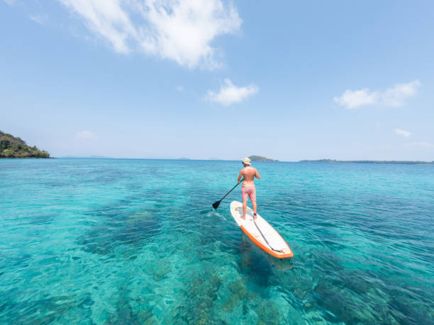 istock Solitary Paddleboard Journey in Pristine Tropical Waters 2152716844