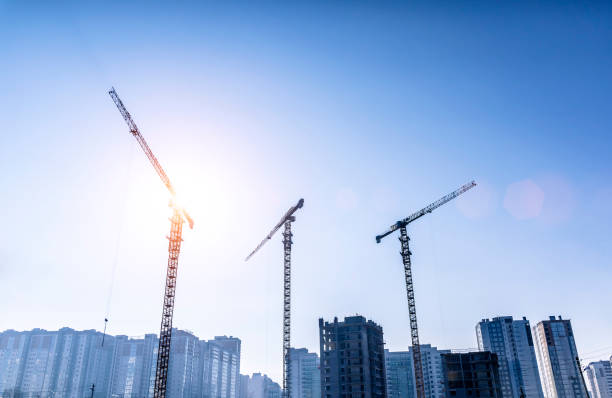 istock Construction industry building. Construction industry site with cranes, fittings and concrete. 2152716895