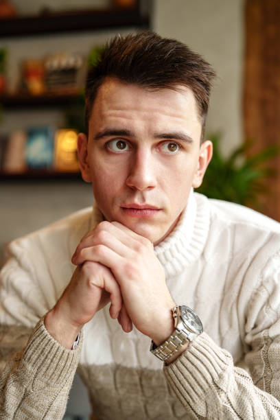 Anxious businessman feeling displeased and looking at camera. Copy space.