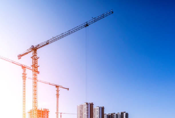 istock Construction industry building. Construction industry site with cranes, fittings and concrete. 2152717029
