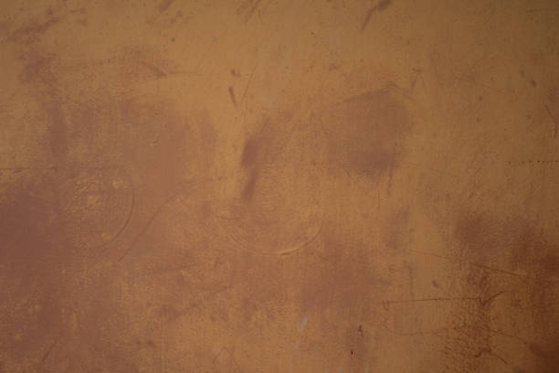 istock Texture of a rusting substrate. Coarse pored background in tangerine red orange. 2152717468