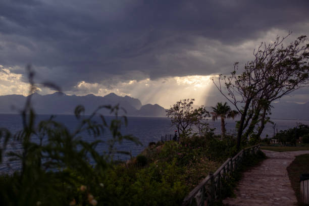 istock God's light touches the sea through the clouds 2152717491