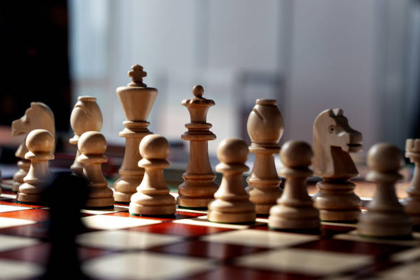 istock Chess on the board before the game starts. Chess pieces, duel, strategy, game concept. 2152717632