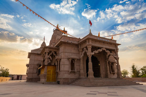 istock artistic hindu temple with dramatic sunset sky at evening from unique perspective 2152718066