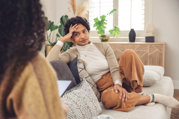 istock Sharing Vulnerabilities: Woman Opens Up to Therapist During Therapy Session 2152719292