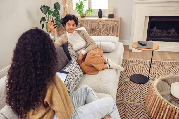 istock Sharing Vulnerabilities: Woman Opens Up to Therapist During Therapy Session 2152719432