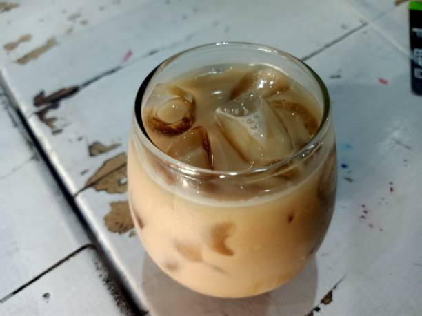 istock Palm sugar milk coffee in a round glass 2152719447