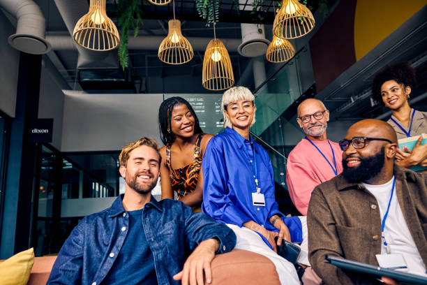 istock Multicultural corporate team in a modern office environment. Diversity and teamwork in business concept for design and print. 2152719809