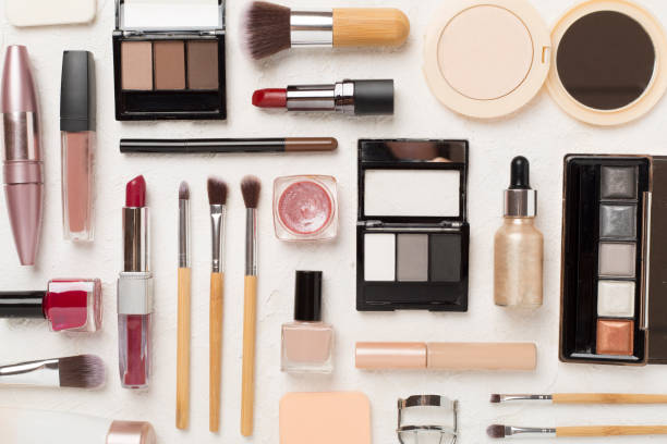istock Flat lay with makeup products and tools on concrete background 2152722057