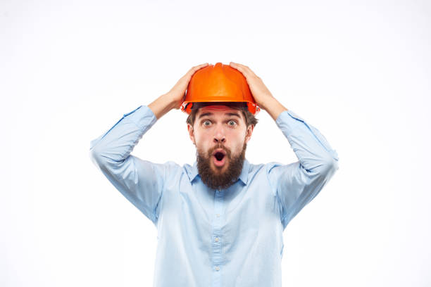 istock engineer in orange safety helmet in construction emotions professional lifestyle 2152722442