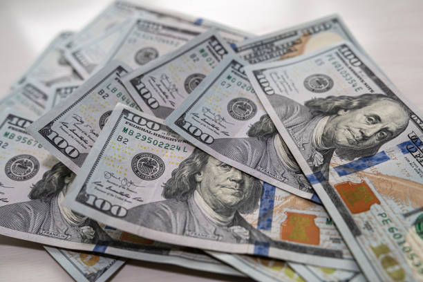 istock American dollars banknotes on office desk 2152723515