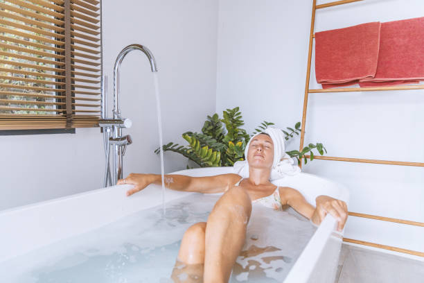 istock A woman unwinding in a bathtub 2152724760
