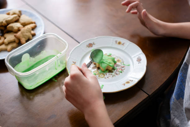 istock Girl making cookies at home 2152725717