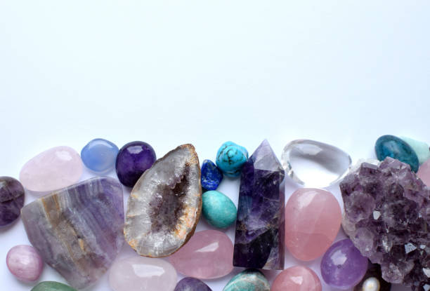 istock Multicolored healing chakra crystals.  Copy space. Real semi-precious stones: rose quartz,  citrine, agate, apatite, kyanite, fluorite. 2152727292