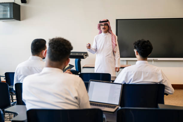 istock Mature university professor lecturing to Saudi students 2152729100