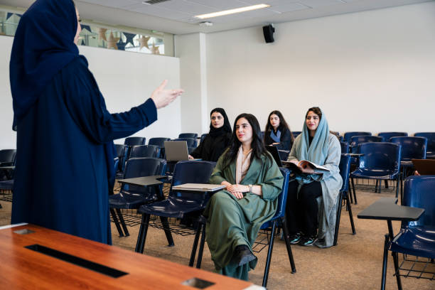 istock Female professor teaching young Saudi women 2152729171