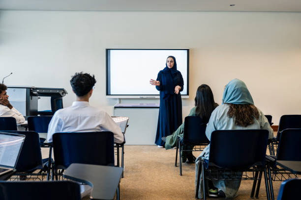 istock Saudi university professor discussing ideas with students 2152729196