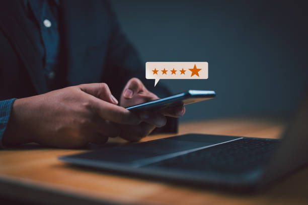 istock User give rating to service experience on online application, Customer review satisfaction feedback survey concept, Customer can evaluate quality of service leading to reputation ranking of business. 2152738257