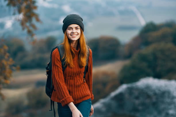 istock Women hiker backpack travel adventure nature fun 2152741631