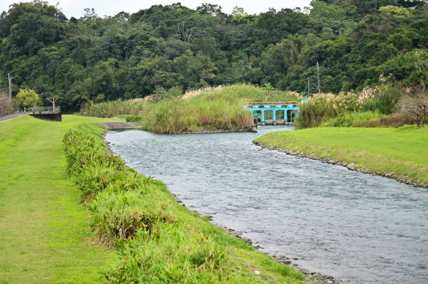 Anong River (安農溪), originally Dianhuo River (電火溪), in Yilan's Sanxing Township, features irrigation facilities that regulate water flow and prevent flooding.