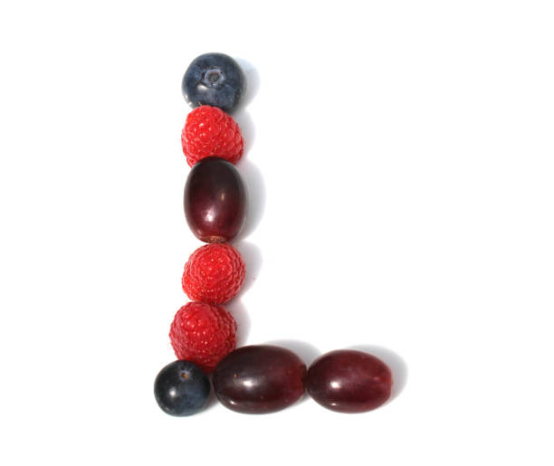 istock letter L made from raspberry, strawberries, blueberries, grape. isolated berries letter for party 2152745174