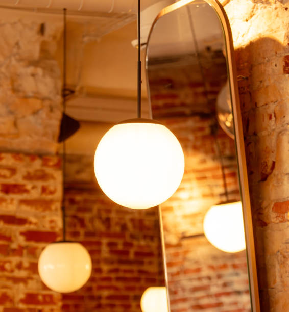 istock Ball-shaped chandeliers in the bar as an interior 2152745567
