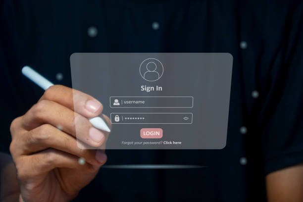 istock Hand holding a pen to login username and password on virtual screen. User sign registration page concept. 2152746804