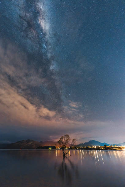 istock Milky way over Willow tree in the night at Lake Wanaka 2152747541