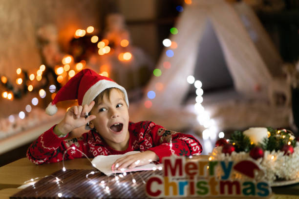 istock Boy knows what gift he wants for Christmas 2152748389