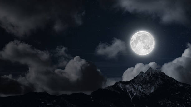 istock a mountain. backgrounds night sky with stars and moon and clouds. 2152752824