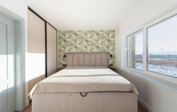 istock Bedroom Interior. Beautiful Sunlight. King Size Bed and Windows. 2152753505